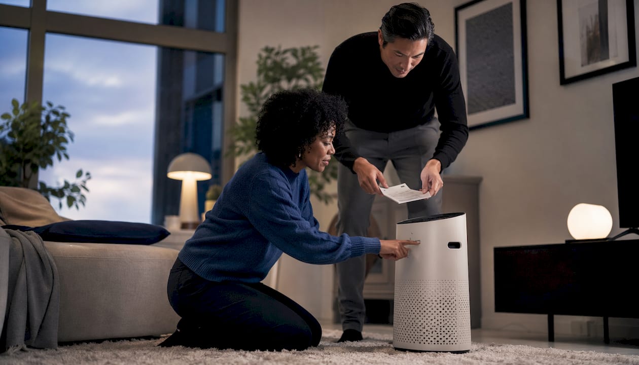 Couple selecting air purifier model together